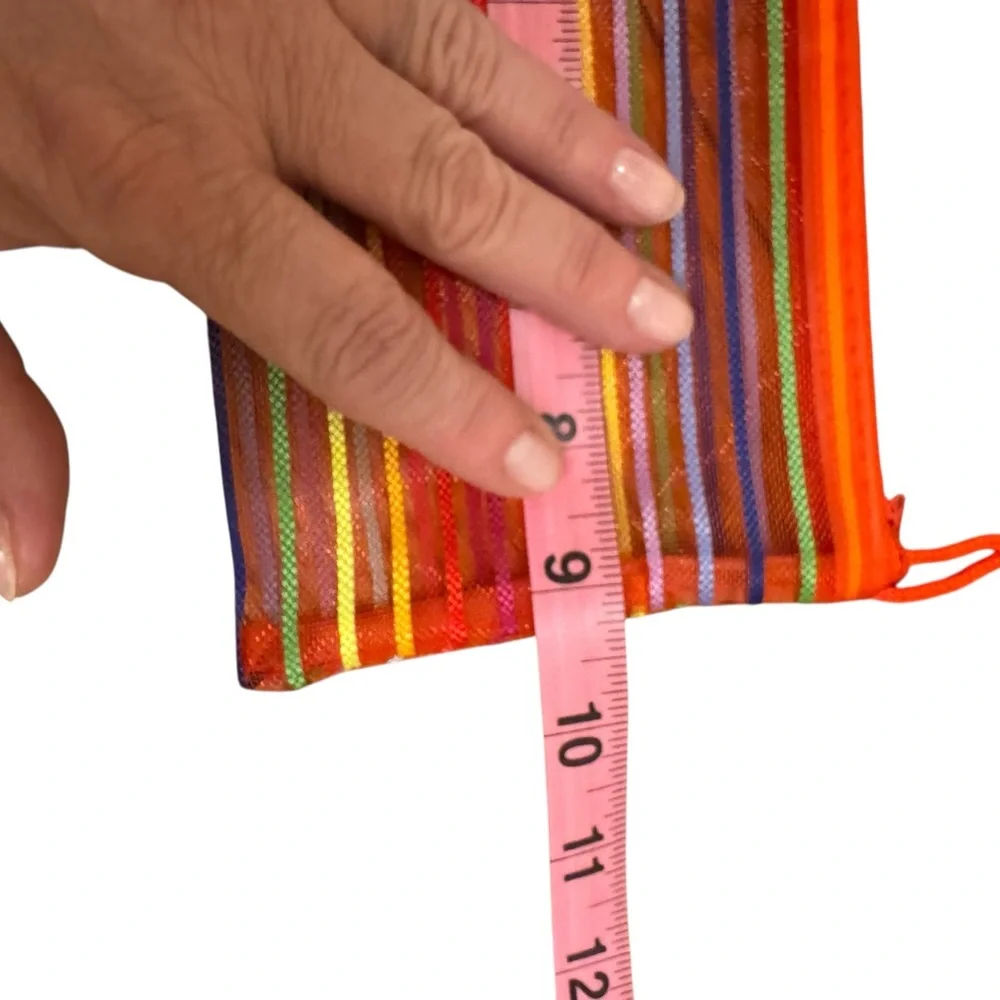 Orange striped mesh zip pouch. EC